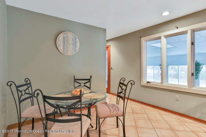 1644 Martin Road Neptune, NJ 07753 - Photo 24 of 42 a view of a dining room with furniture and a window
