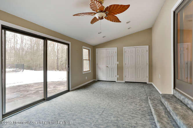 1644 Martin Road Neptune, NJ 07753 - Photo 25 of 42 a view of a livingroom with a ceiling fan and window