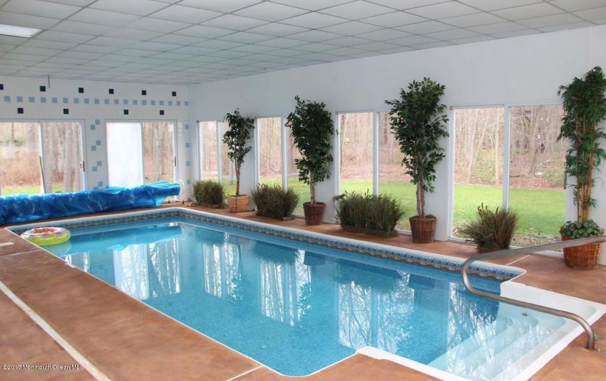 1644 Martin Road Neptune, NJ 07753 - Photo 34 of 42 a view of swimming pool with outdoor seating