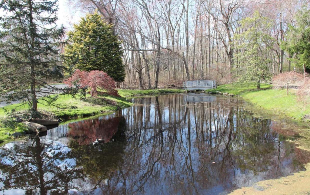 1644 Martin Road Neptune, NJ 07753 - Photo 40 of 42 a view of a backyard with wooden fence