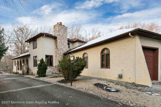 1644 Martin Road Neptune, NJ 07753 - Photo 5 of 42 a front view of a house with garden