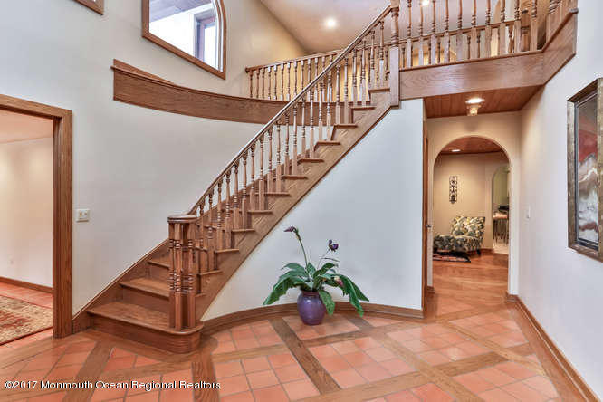 1644 Martin Road Neptune, NJ 07753 - Photo 8 of 42 a view of entryway and hall with wooden floor