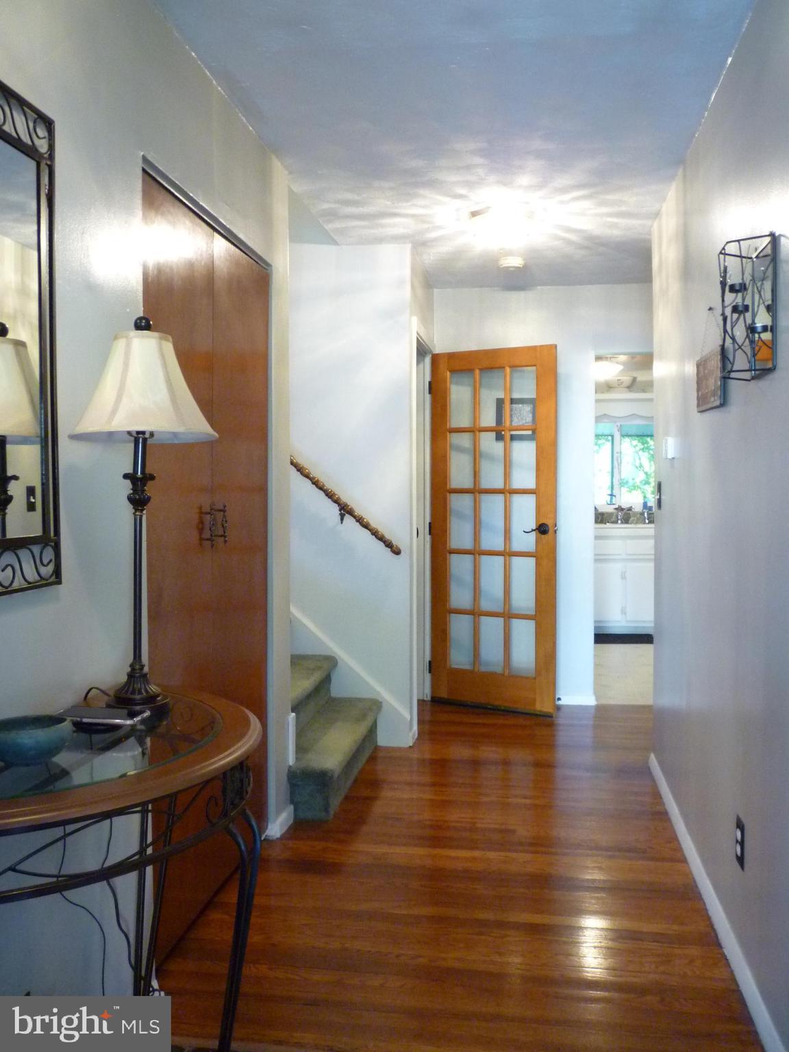 21 Merriman Road Newark, DE 19713 - Photo 8 of 44 Foyer & coat closet with gleaming hardwood floors