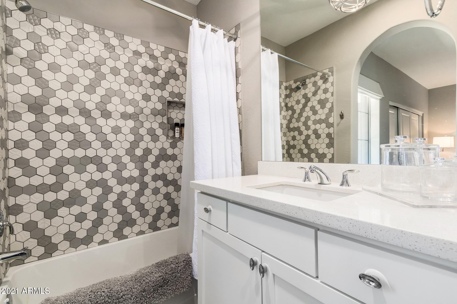 3935 East Rough Rider Road, Unit 1375 Phoenix, AZ 85050 - Photo 35 of 52 En Suite Bathroom