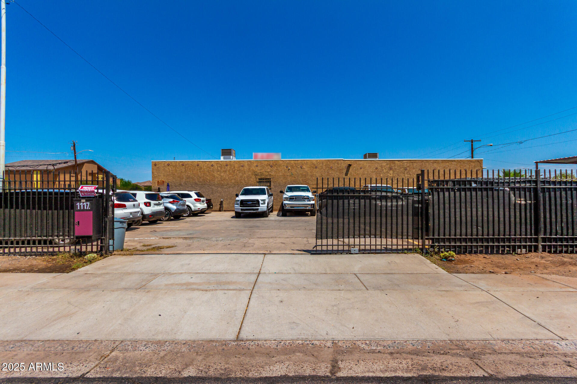 1117 West Buckeye Road, Unit 5 Phoenix, AZ 85007 - Photo 30 of 32 a view of street with parked cars