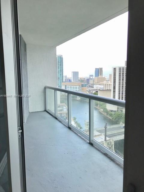 475 Brickell Avenue, Unit 2014 Miami, FL 33131 - Photo 11 of 14 a view of a room with a sink and balcony