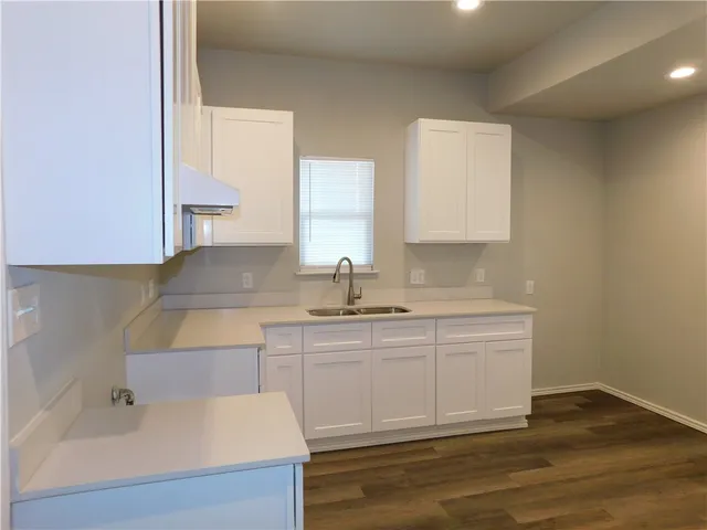 a bathroom with a sink and a bathtub