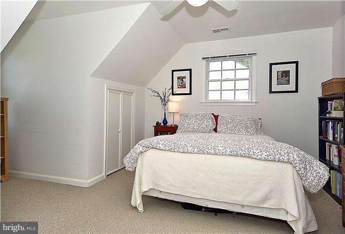 4904 South Chesterfield Road Arlington, VA 22206 - Photo 27 of 30 a bedroom with a bed and window