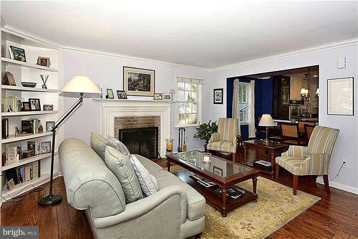 4904 South Chesterfield Road Arlington, VA 22206 - Photo 7 of 30 a living room with furniture or couch and a fireplace