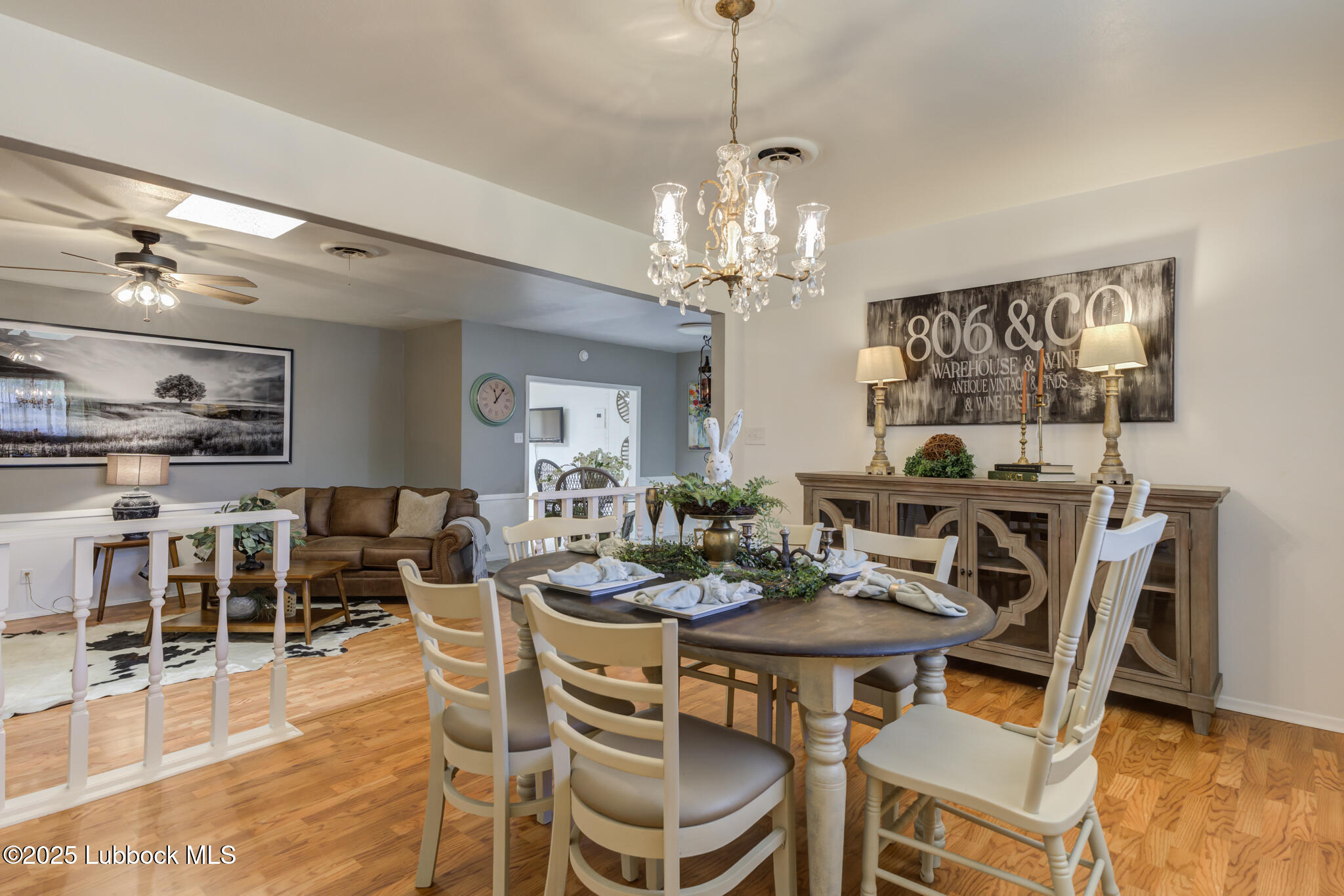 1205 Garland Plainview, TX 79072 - Photo 14 of 50 a view of a dining room with furniture wooden floor and chandelier