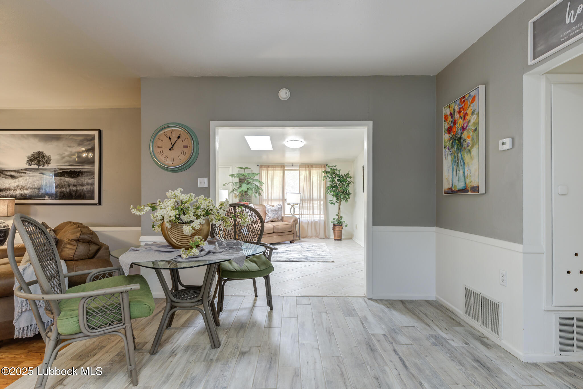 1205 Garland Plainview, TX 79072 - Photo 17 of 50 a living room with furniture and wooden floor