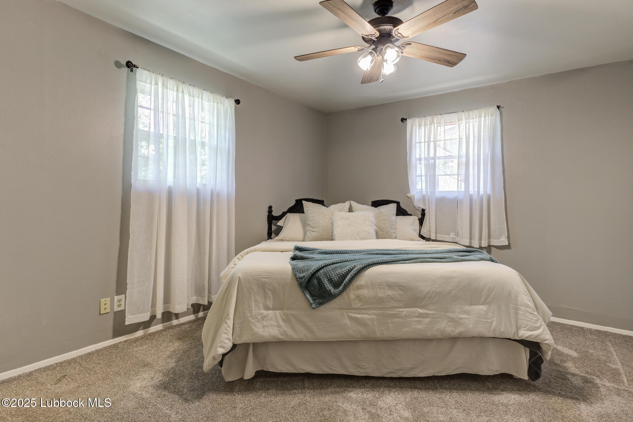 1205 Garland Plainview, TX 79072 - Photo 24 of 50 a bedroom with a bed and window