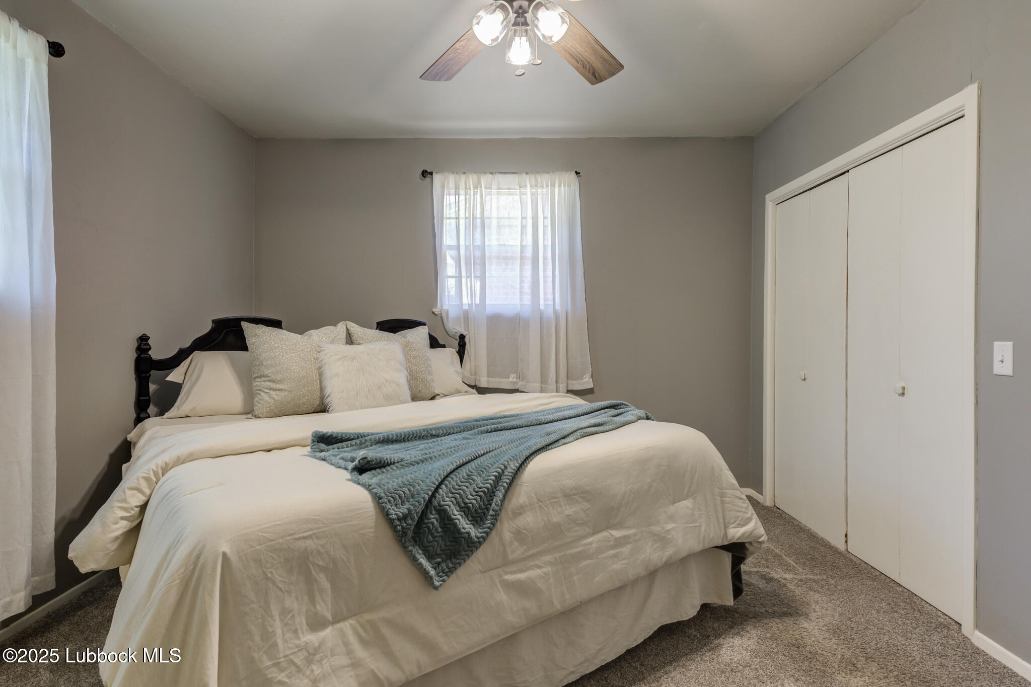 1205 Garland Plainview, TX 79072 - Photo 25 of 50 a bedroom with a bed and a window