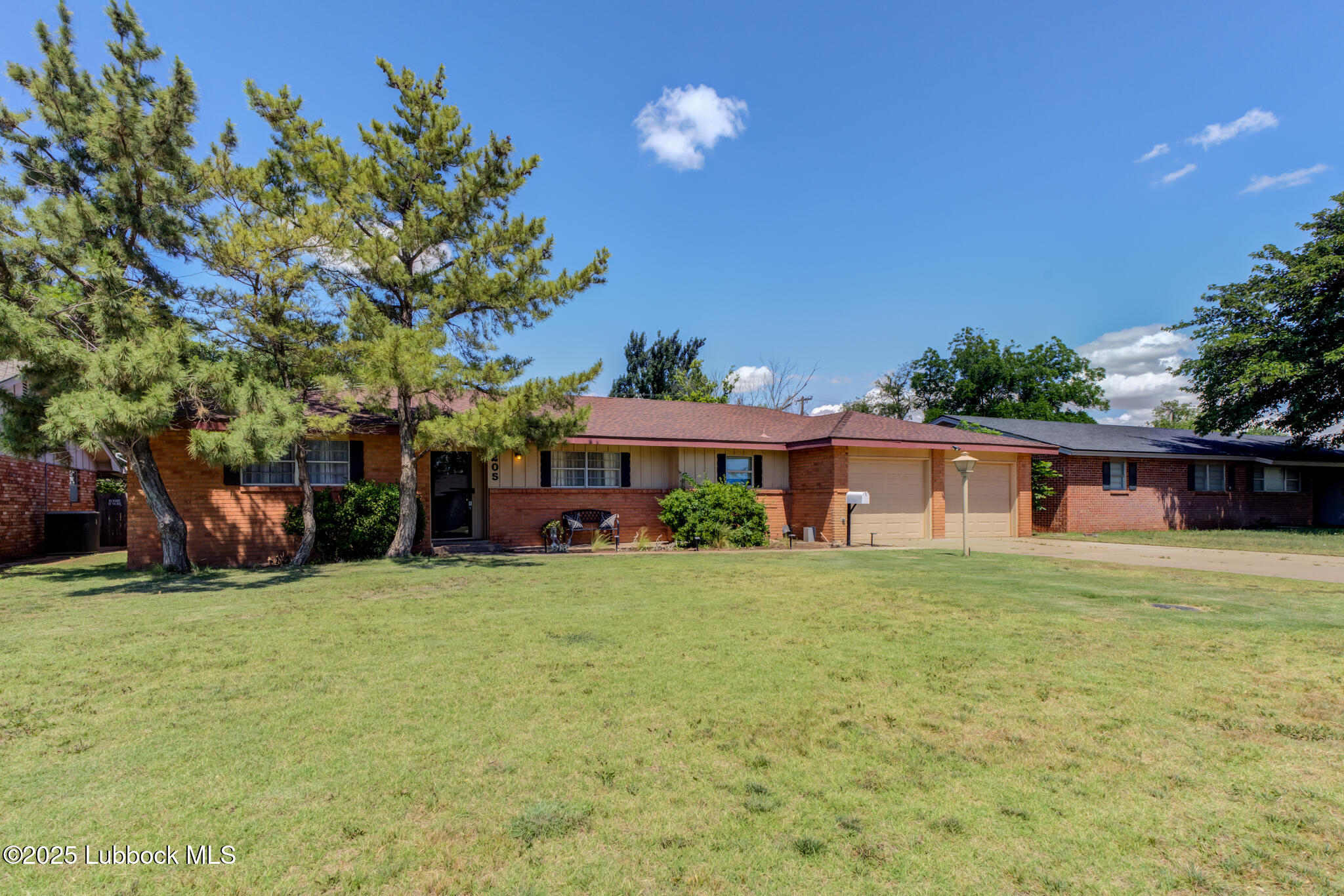 1205 Garland Plainview, TX 79072 - Photo 3 of 50 a view of a house with a yard and sitting area