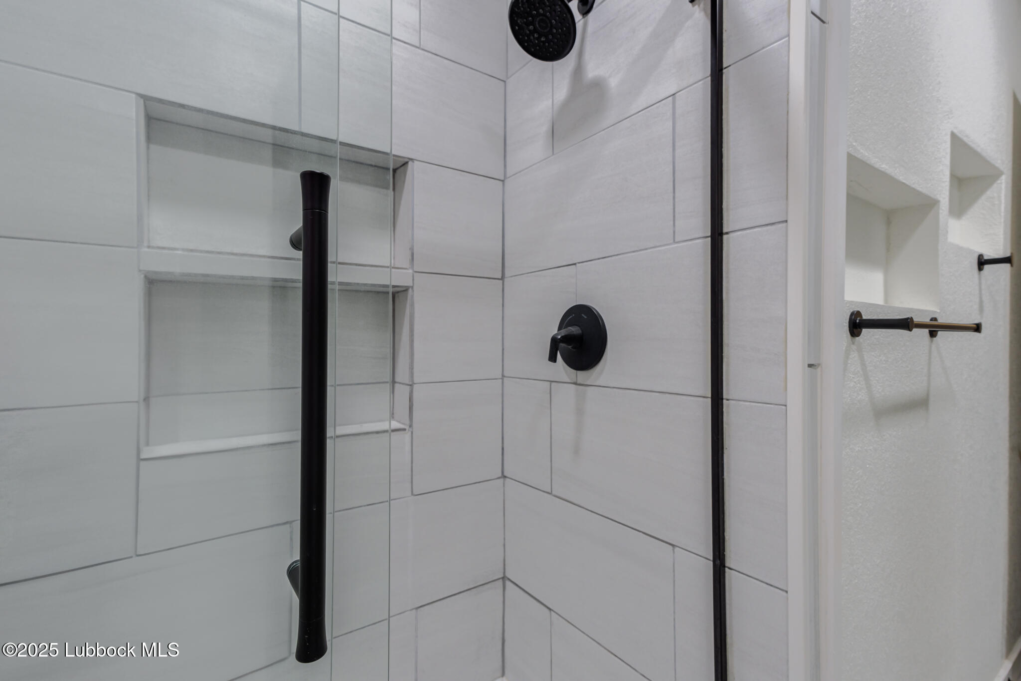 1205 Garland Plainview, TX 79072 - Photo 34 of 50 a bathroom with a shower