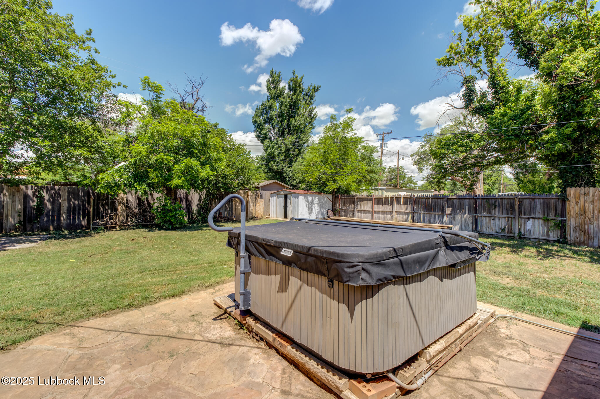 1205 Garland Plainview, TX 79072 - Photo 46 of 50 a view of a chairs and table in the yard