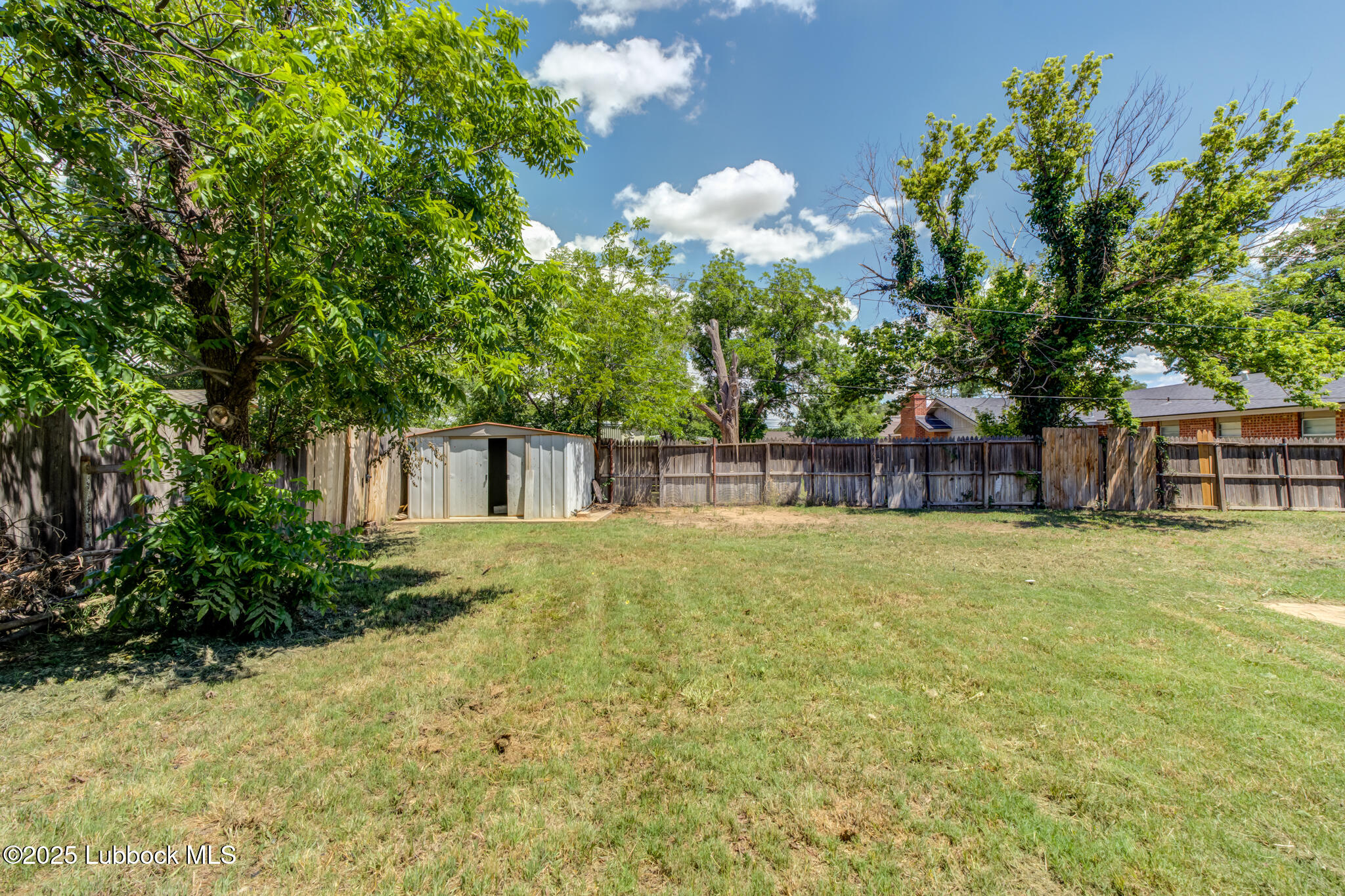 1205 Garland Plainview, TX 79072 - Photo 48 of 50 a view of a house with a backyard