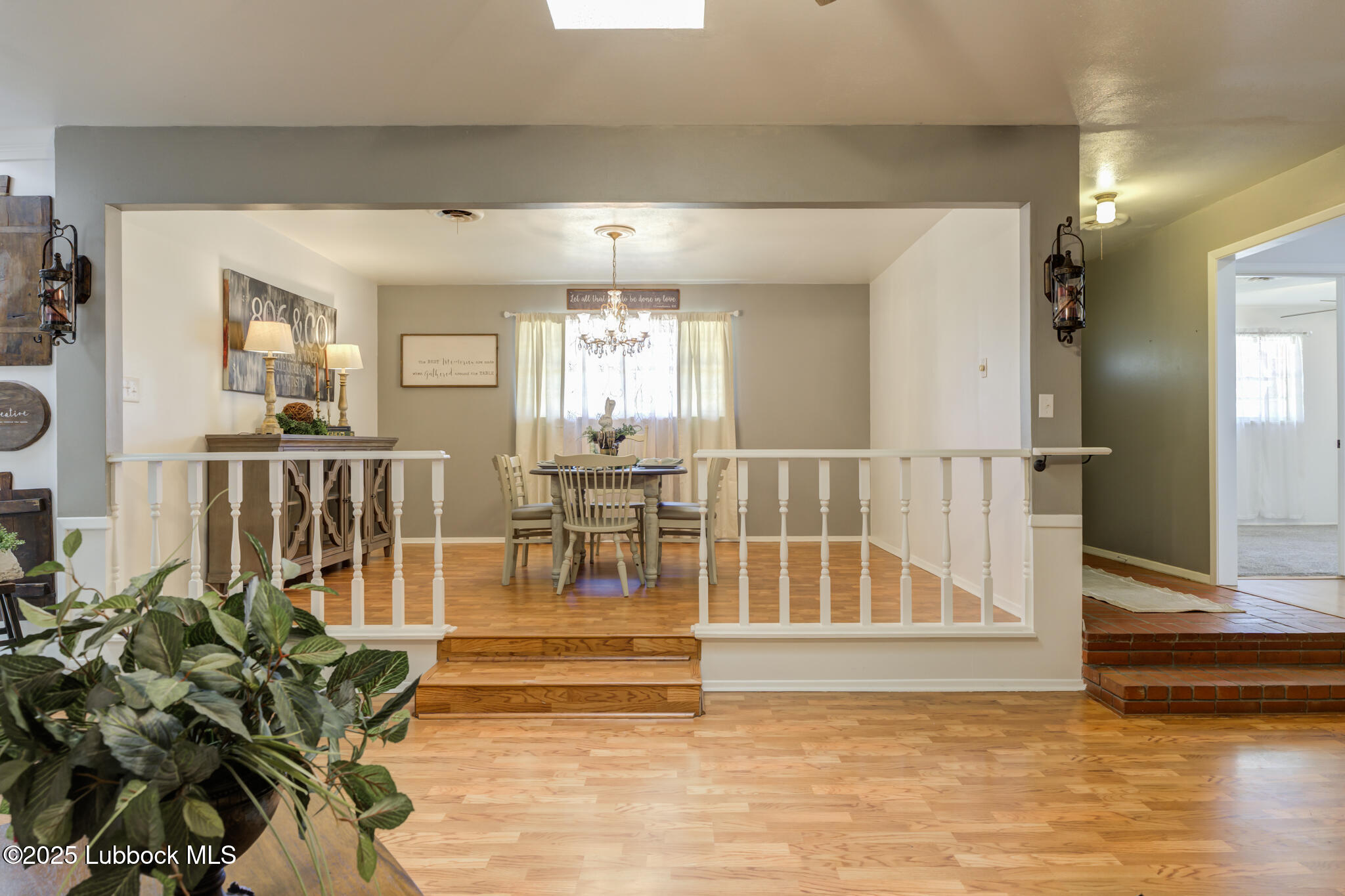 1205 Garland Plainview, TX 79072 - Photo 9 of 50 a view of an entryway with wooden floor
