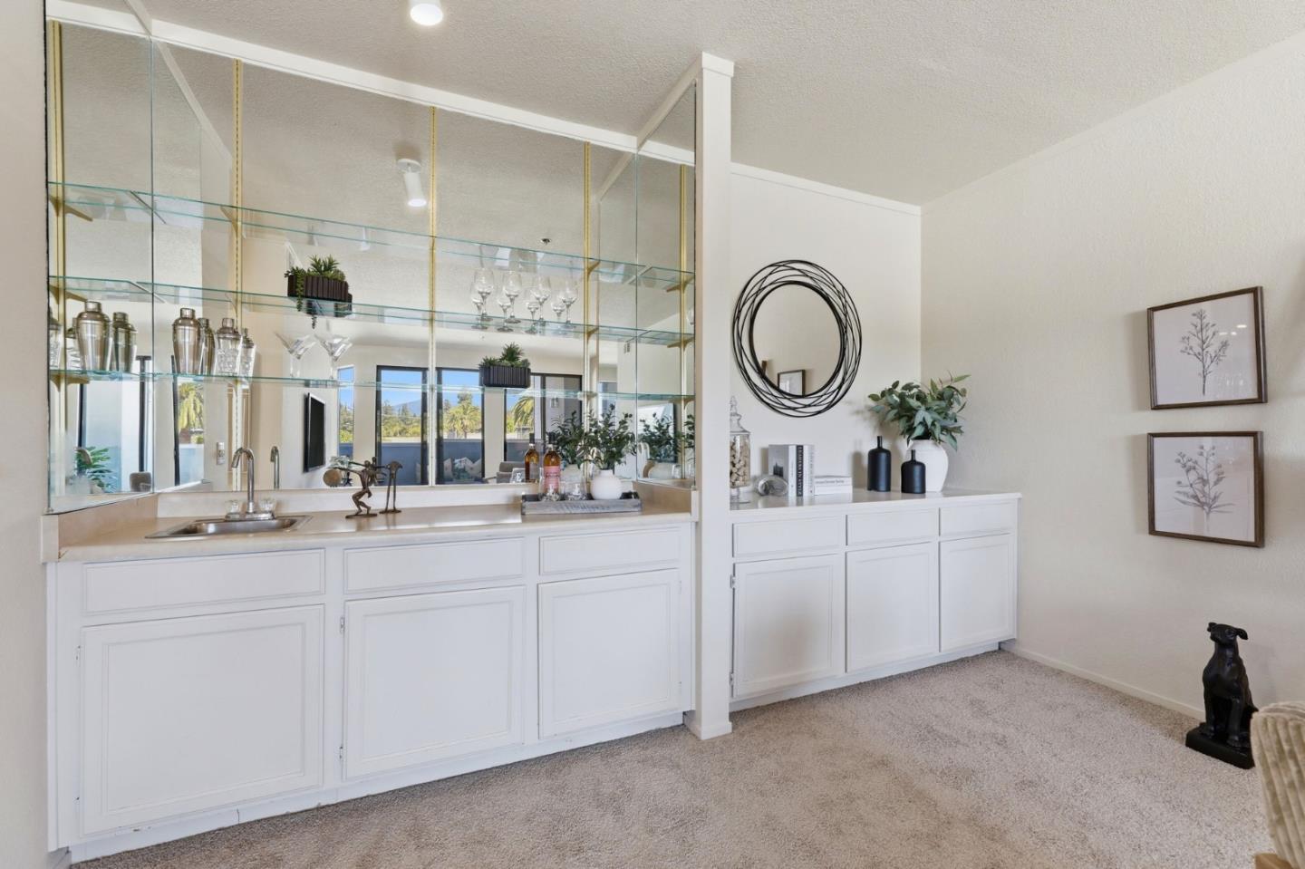 22330 Homestead Road, Unit 226 Cupertino, CA 95014 - Photo 17 of 38 a room with mirror and sink