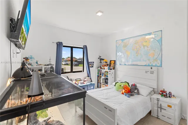 a room with furniture and air hockey table