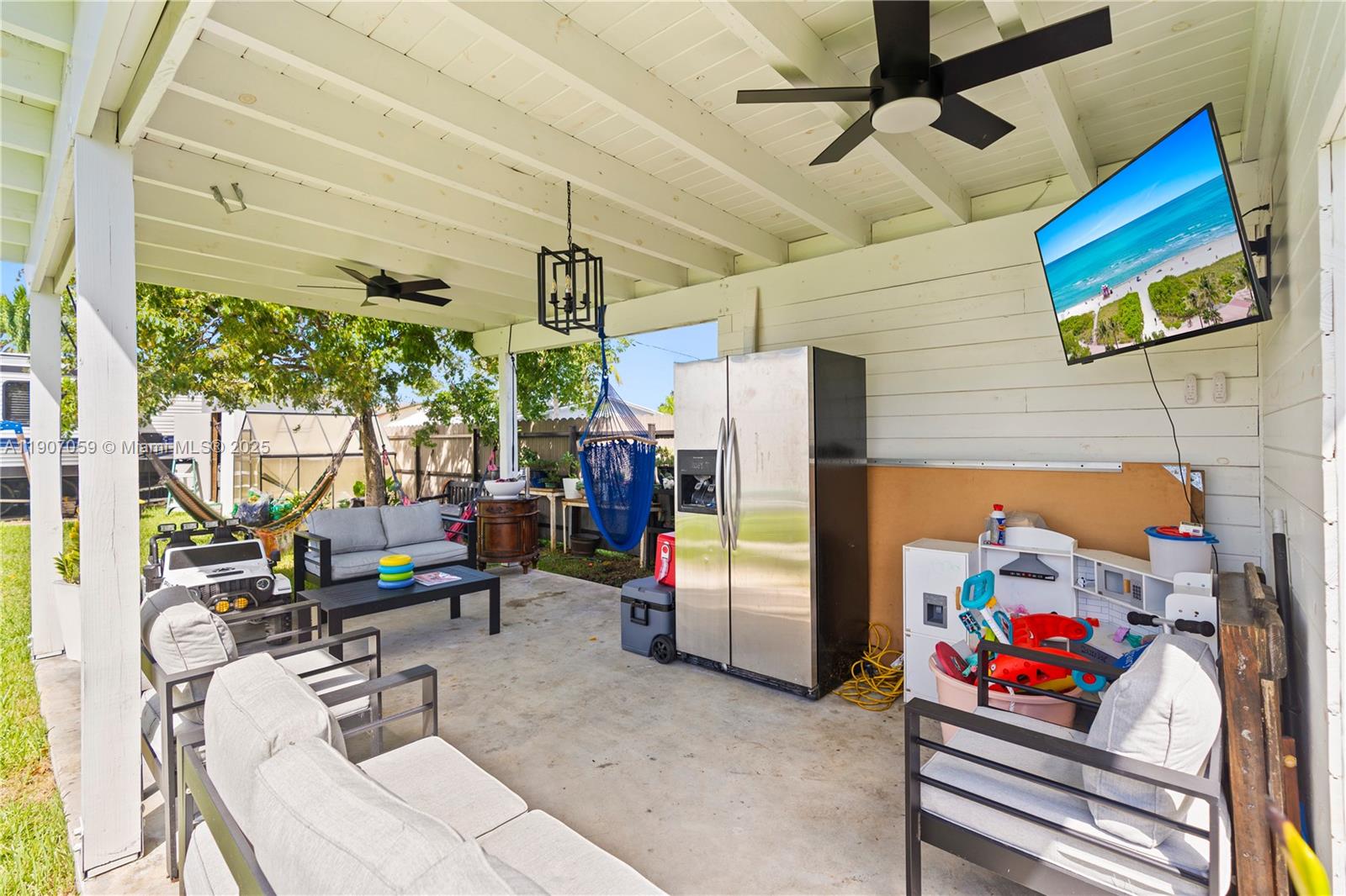 10925 Southwest 218th Terrace Miami, FL 33170 - Photo 26 of 32 a storage room with furniture and a window