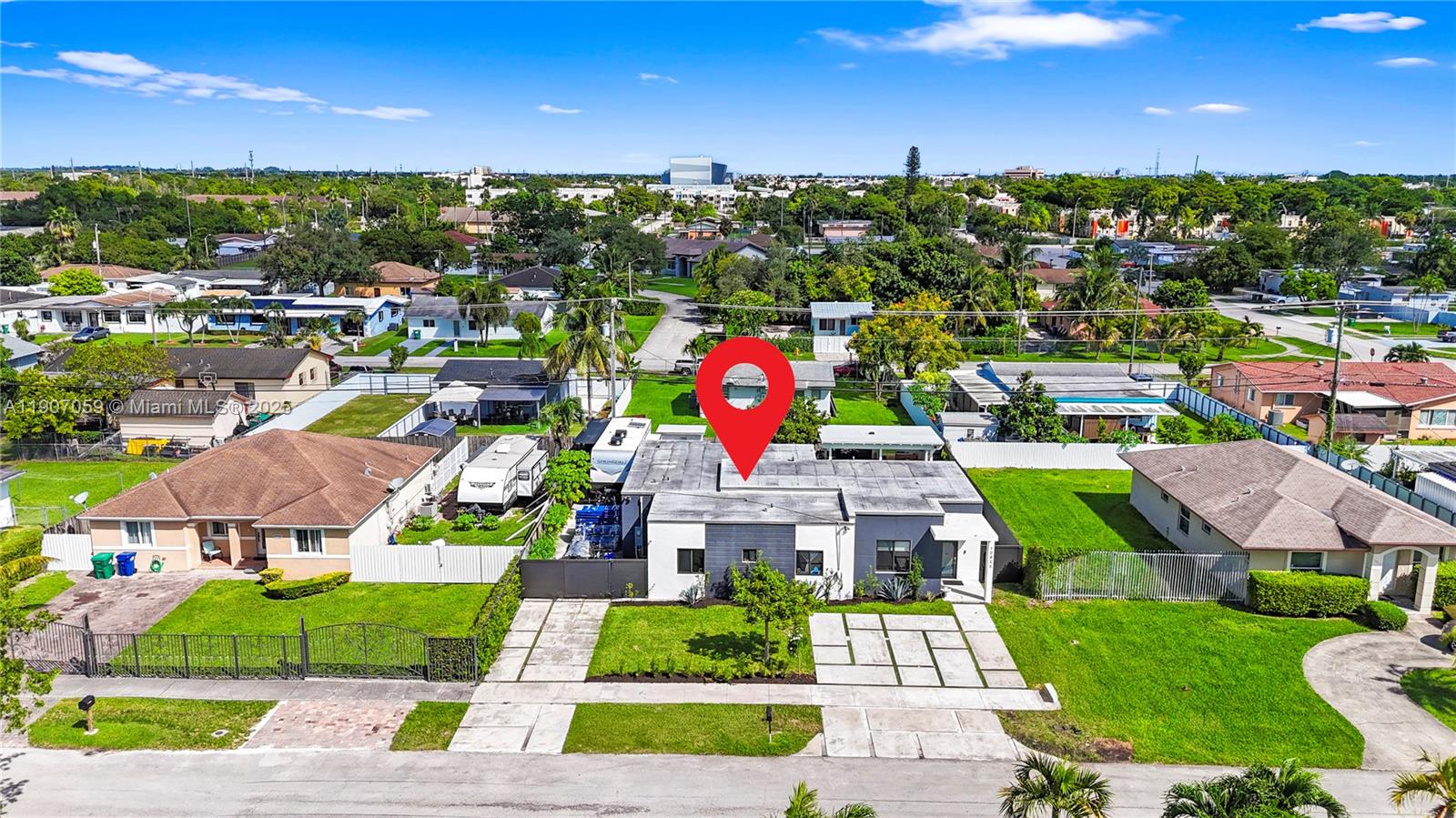 10925 Southwest 218th Terrace Miami, FL 33170 - Photo 4 of 32 a view of multiple houses with yard