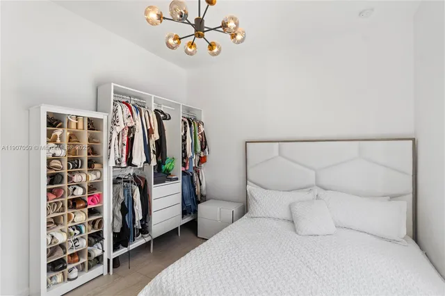 a bedroom with baby toys and a couch