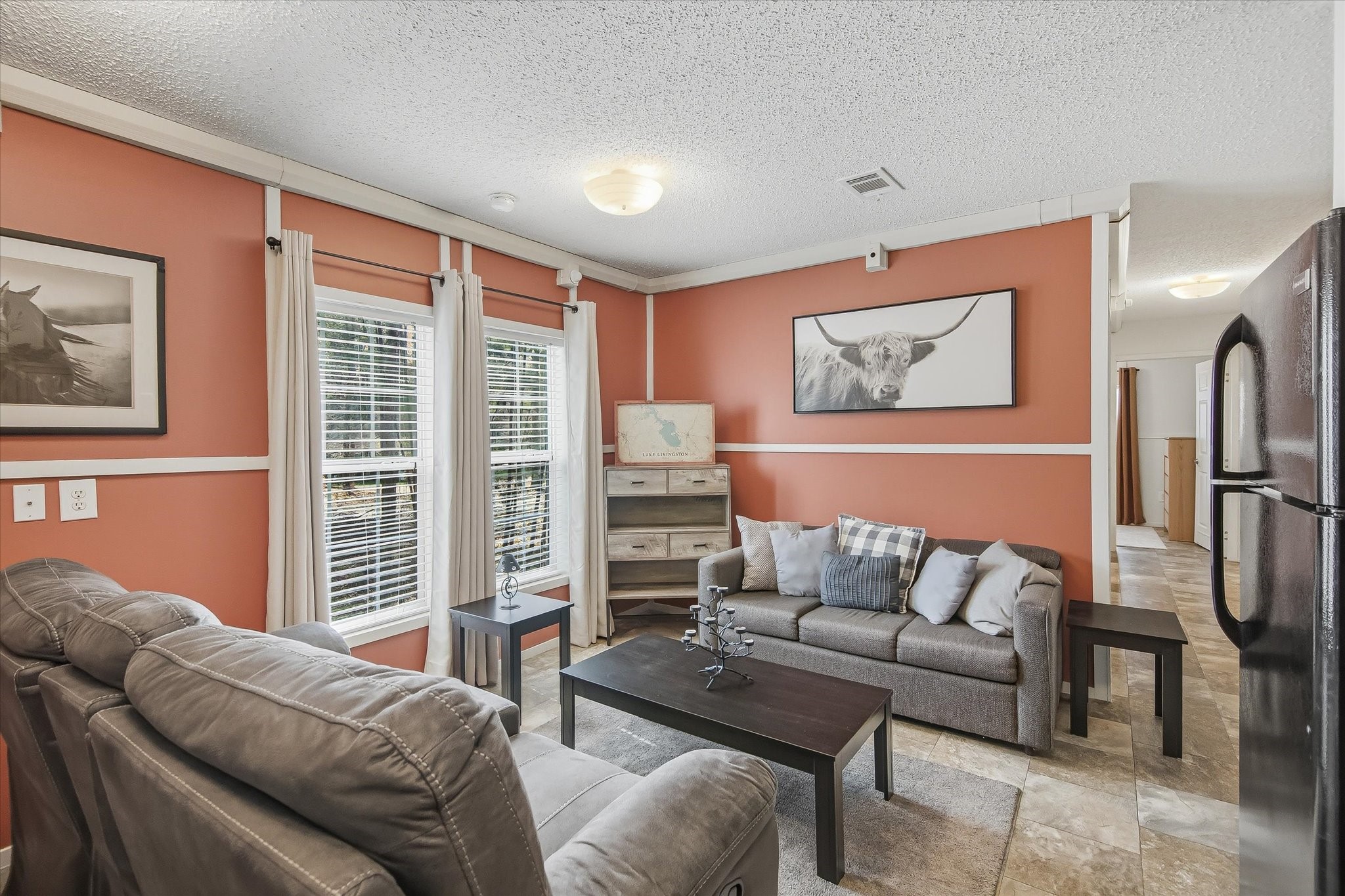 180 Elm Trail Trinity, TX 75862 - Photo 14 of 44 a living room with furniture and a window