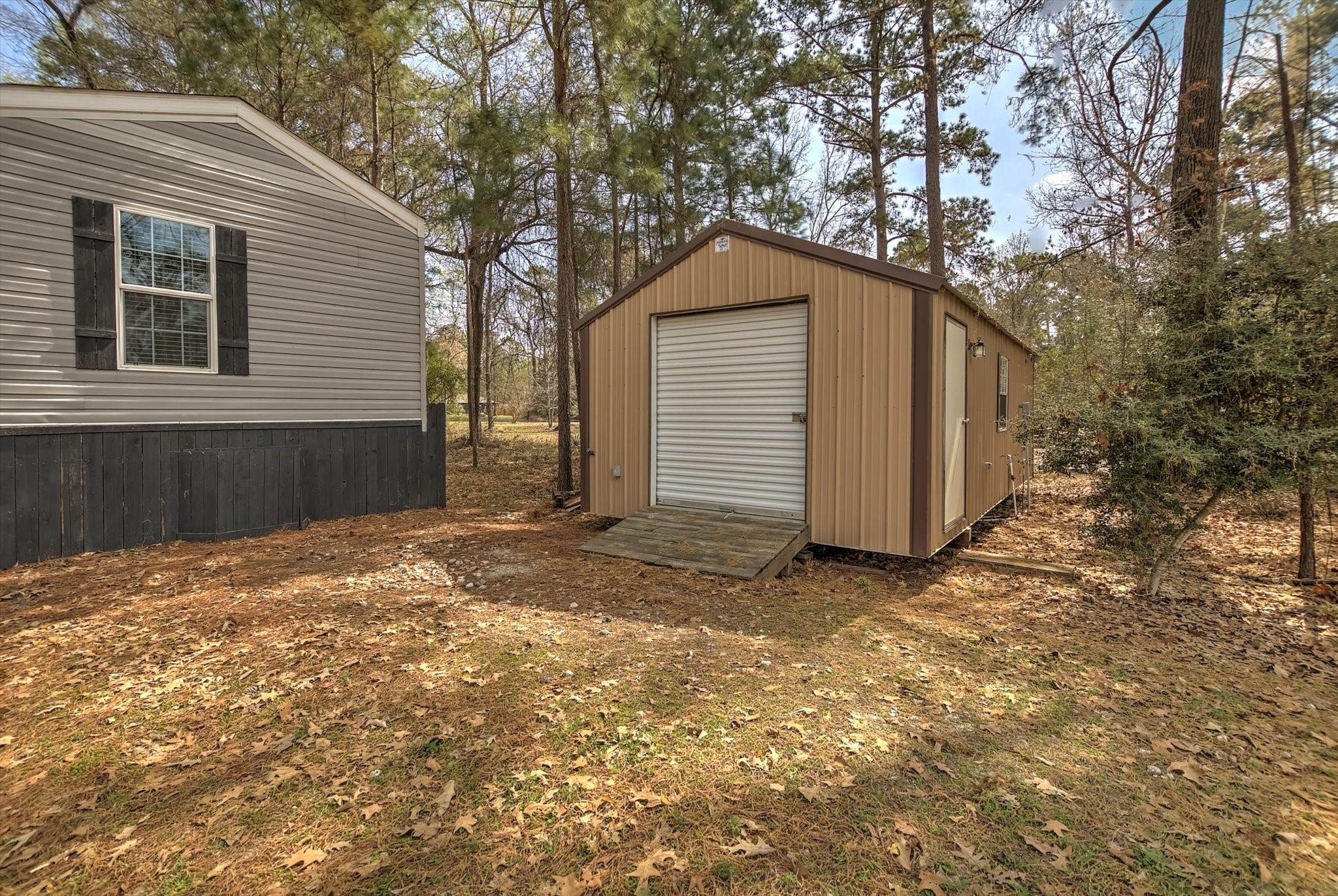 180 Elm Trail Trinity, TX 75862 - Photo 34 of 44 a view of a backyard of the house
