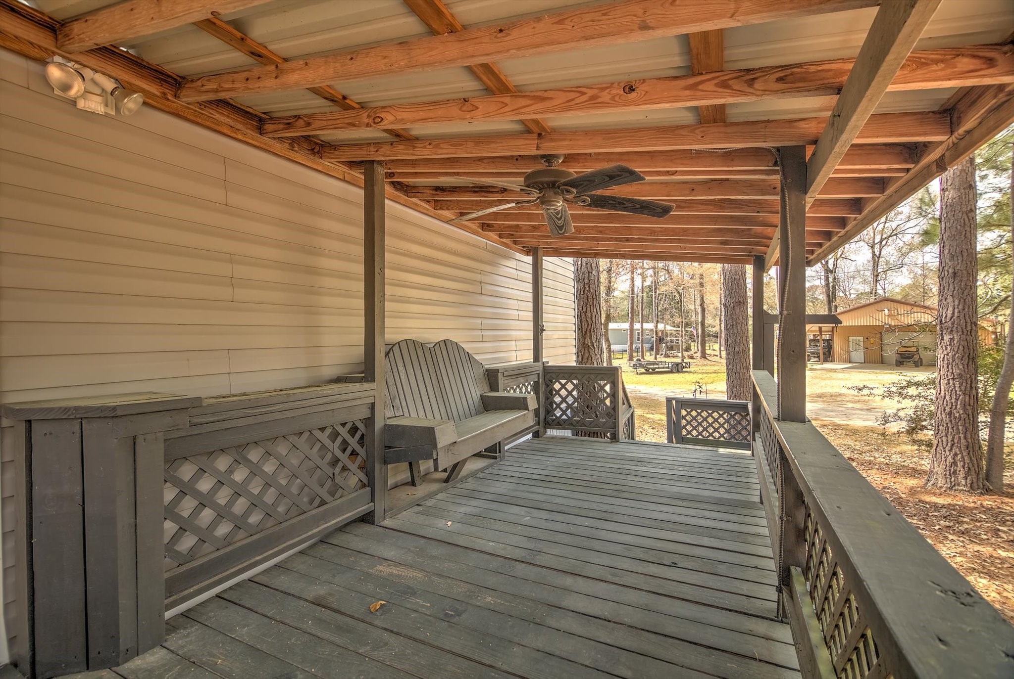 180 Elm Trail Trinity, TX 75862 - Photo 5 of 44 a view of a balcony with wooden floor