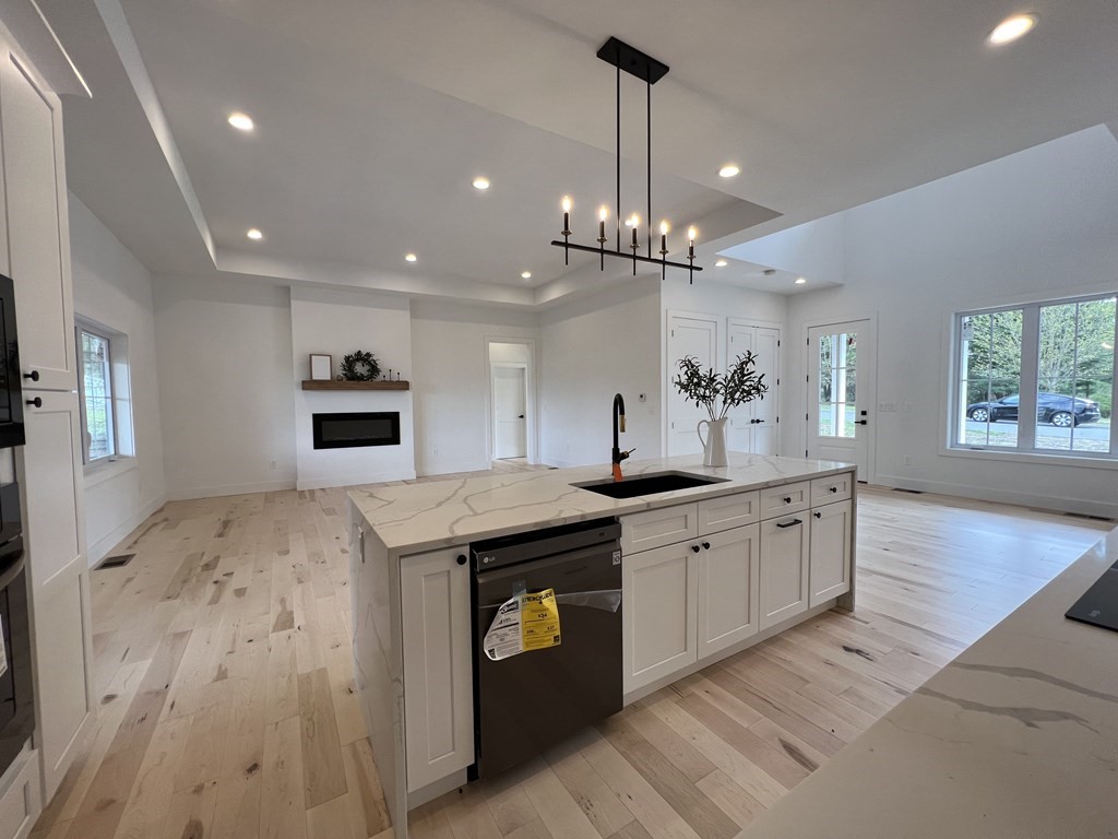 47 Stratton Farms Road Suffield, CT 06093 - Photo 11 of 28 a large kitchen with stainless steel appliances a large counter top