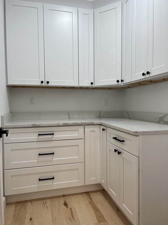 47 Stratton Farms Road Suffield, CT 06093 - Photo 16 of 28 a view of cabinets and utility room