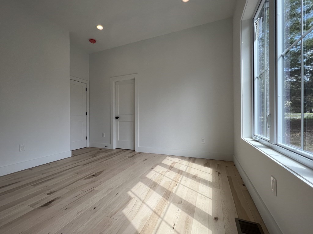 47 Stratton Farms Road Suffield, CT 06093 - Photo 22 of 28 a view of an empty room and window