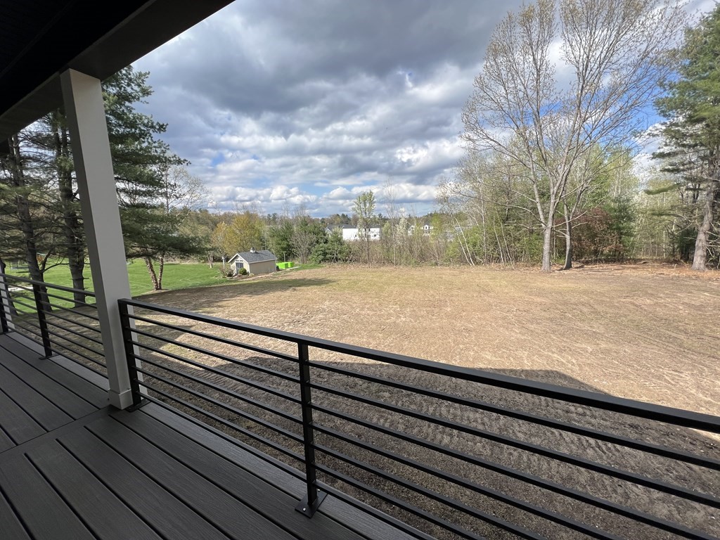 47 Stratton Farms Road Suffield, CT 06093 - Photo 28 of 28 a view of a yard with wooden fence
