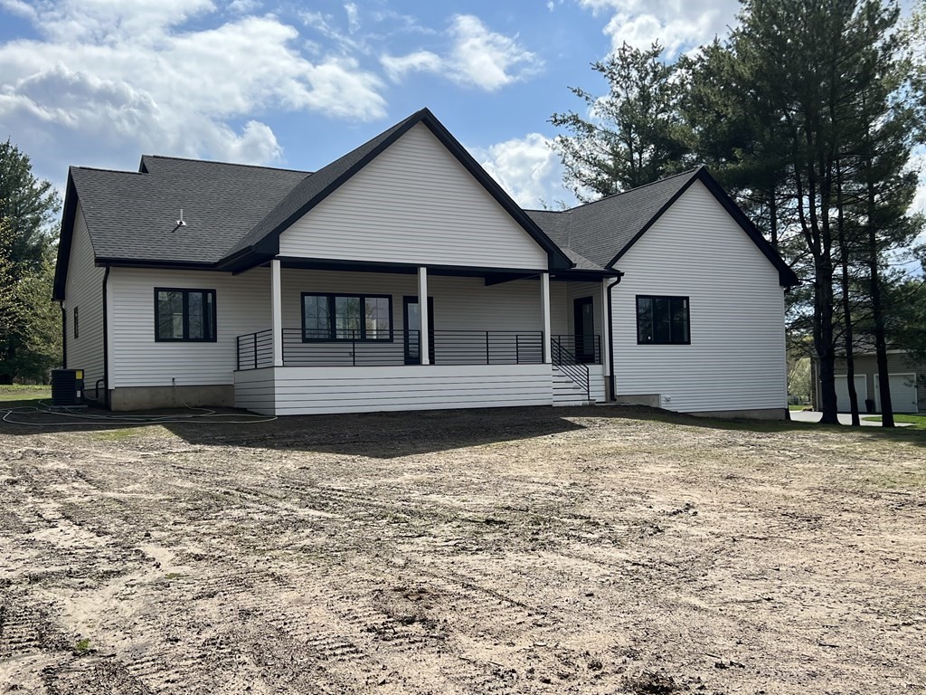 47 Stratton Farms Road Suffield, CT 06093 - Photo 4 of 28 a house with trees in the background