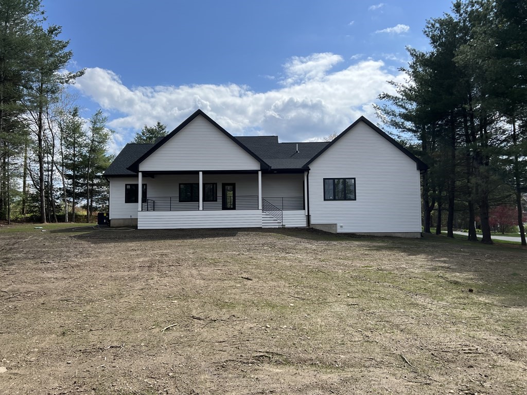 47 Stratton Farms Road Suffield, CT 06093 - Photo 5 of 28 a house with trees in the background