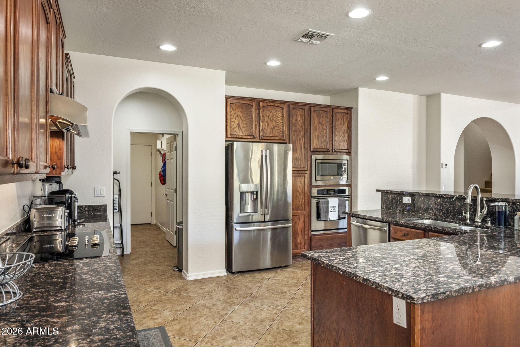 3980 East Robin Lane Phoenix, AZ 85050 - Photo 8 of 31 Kitchen- Huge Pantry down the hall