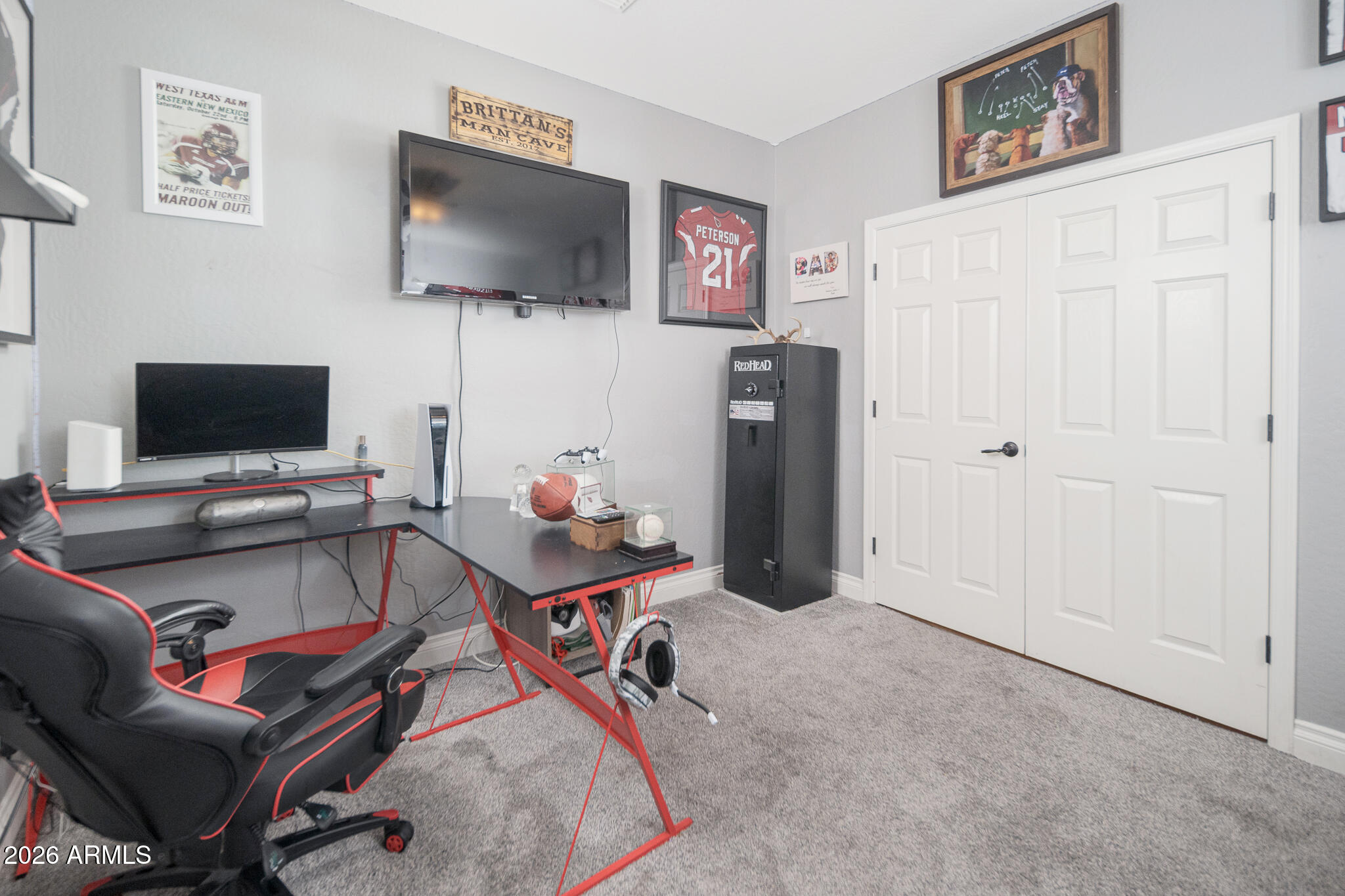 10789 West Yearling Road Peoria, AZ 85383 - Photo 14 of 35 a living room with furniture and a flat screen tv