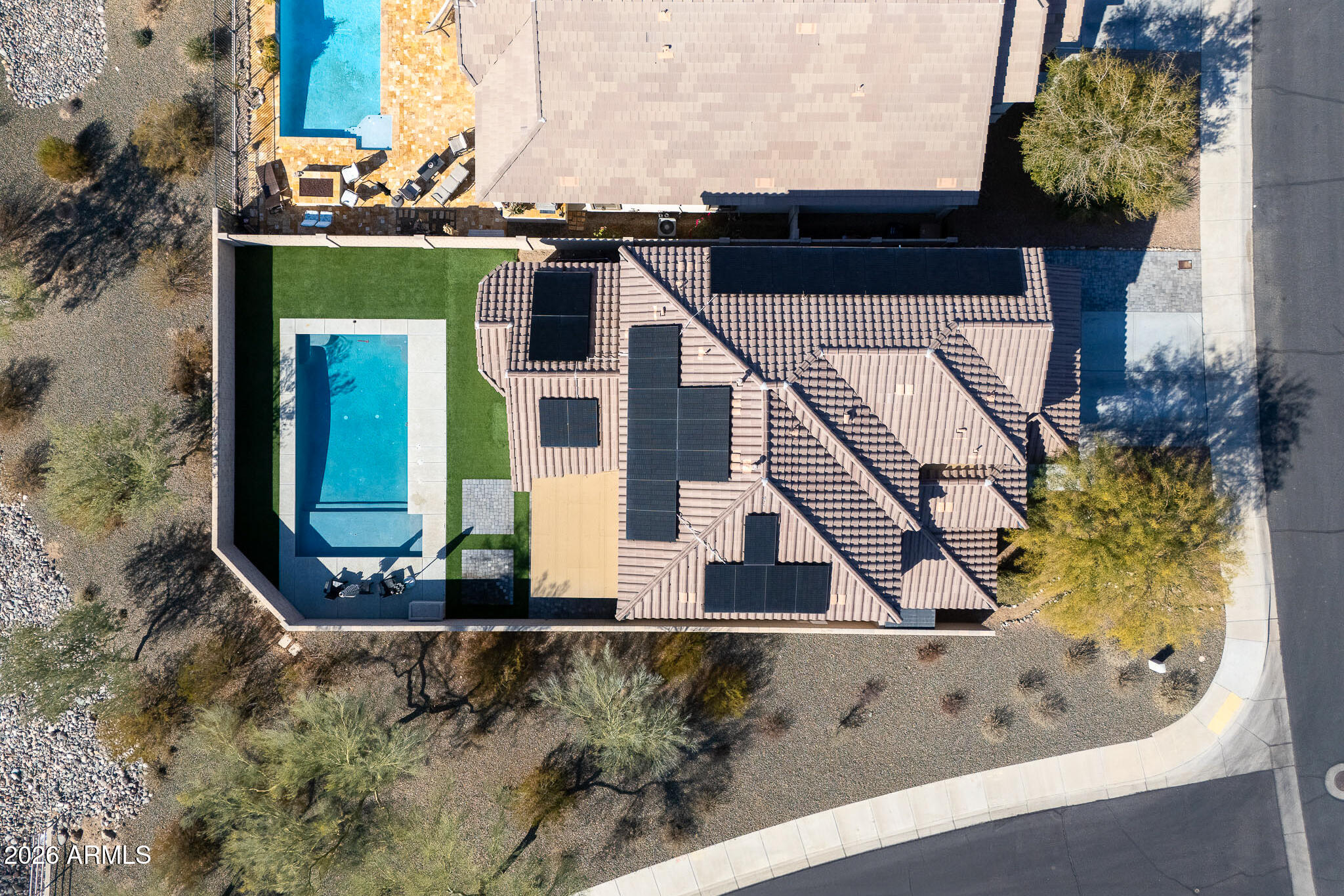 10789 West Yearling Road Peoria, AZ 85383 - Photo 25 of 35 an aerial view of a house with swimming pool