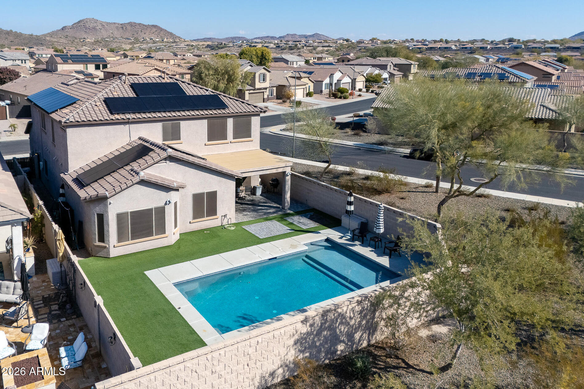 10789 West Yearling Road Peoria, AZ 85383 - Photo 28 of 35 an aerial view of a house with a yard