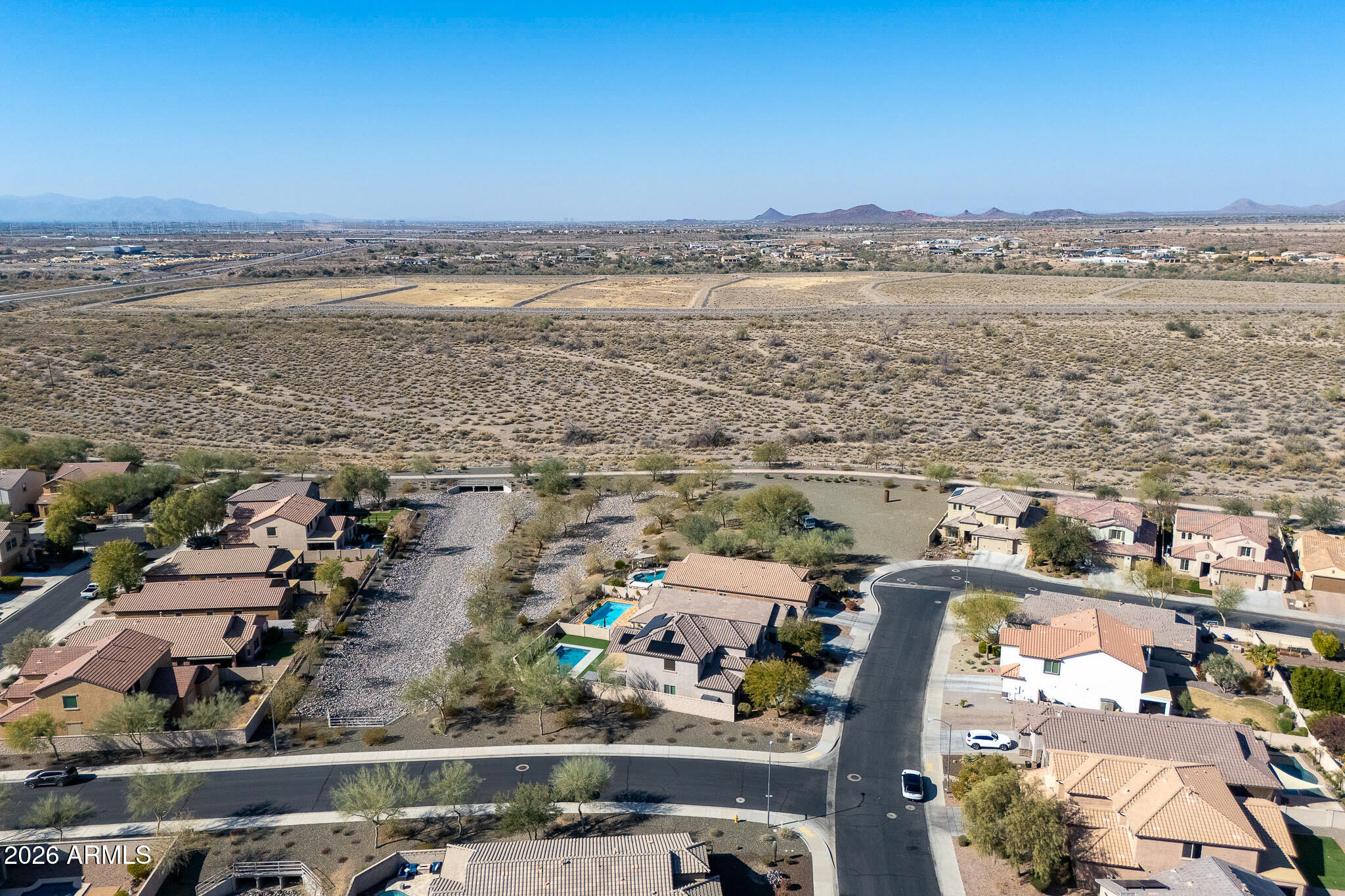 10789 West Yearling Road Peoria, AZ 85383 - Photo 34 of 35 an aerial view of ocean and residential houses with outdoor space