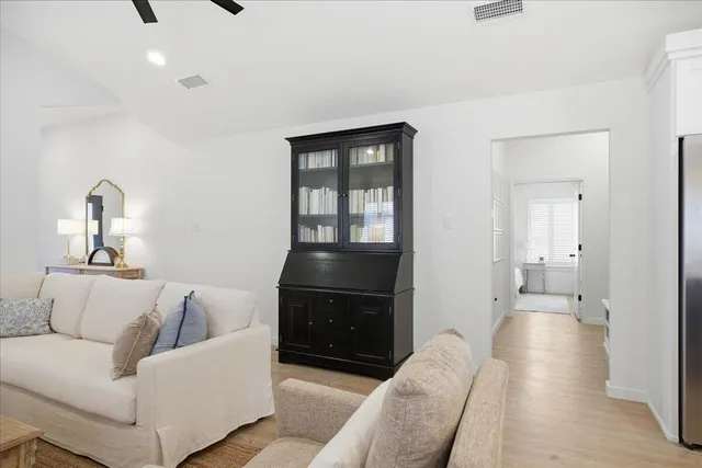 a kitchen with stainless steel appliances granite countertop a sink counter space and a stove top oven