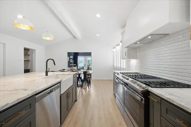 a view of a dining room with furniture