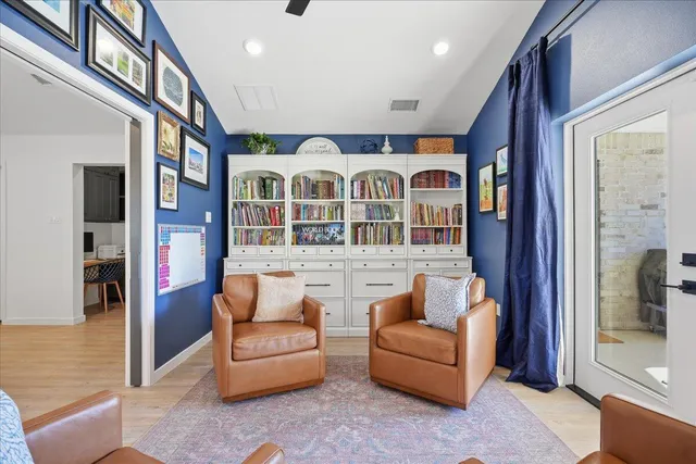 a view of workspace with wooden cabinet