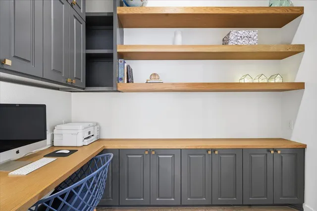 a spacious bathroom with a double vanity sink a mirror and a bathtub