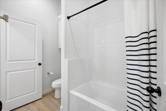 a room with gym equipment and a window