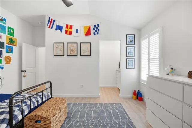 a bathroom with a shower and a sink