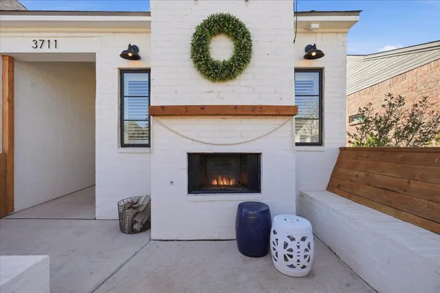 a view of hallway with wooden floor