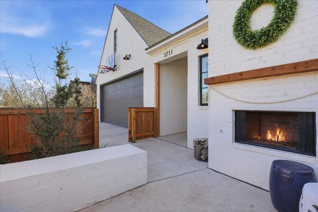 a view of a livingroom with furniture and a fireplace