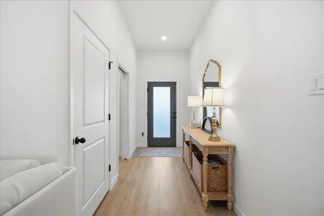a living room with furniture fireplace and window